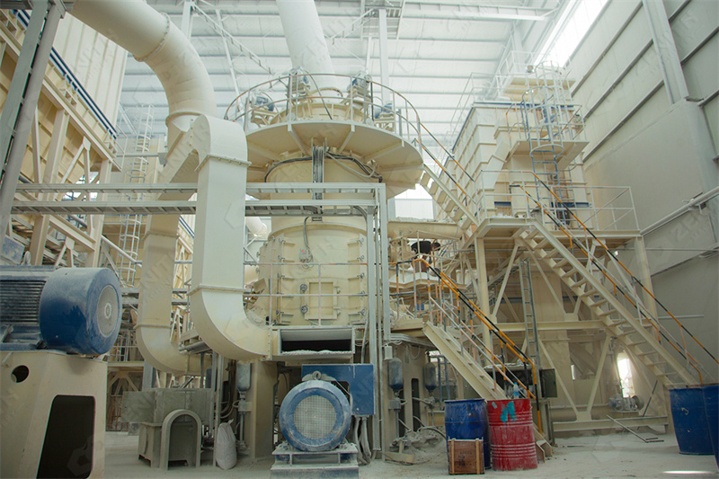 Modern grinding mill in operation showing material flow